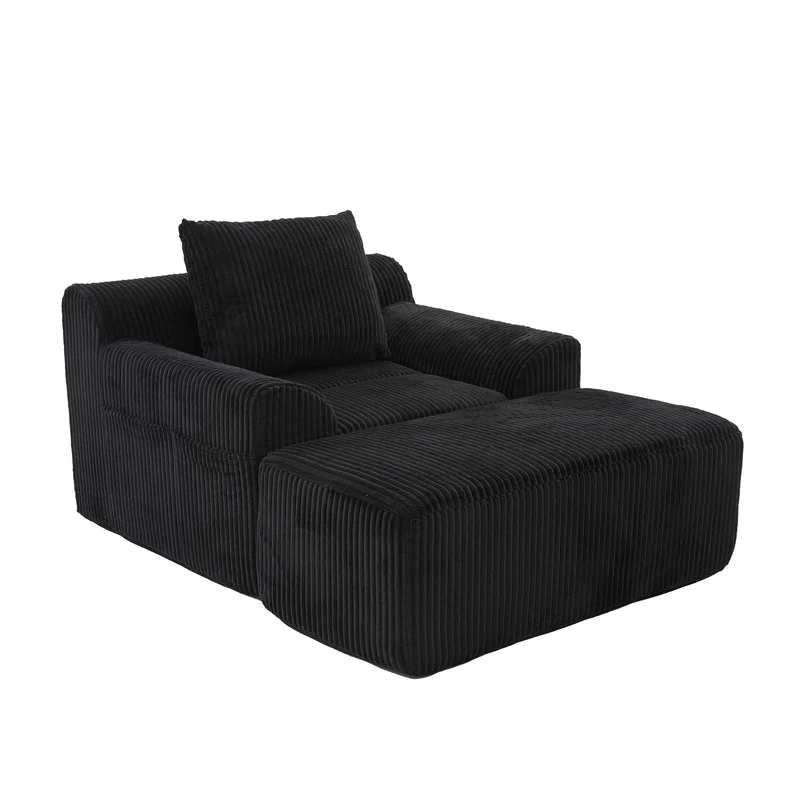 Canapé simple fauteuil XXL en velours côtelé noir, dossier profond, repose pied, coussin & poches latérales, sans montage CHROMONET